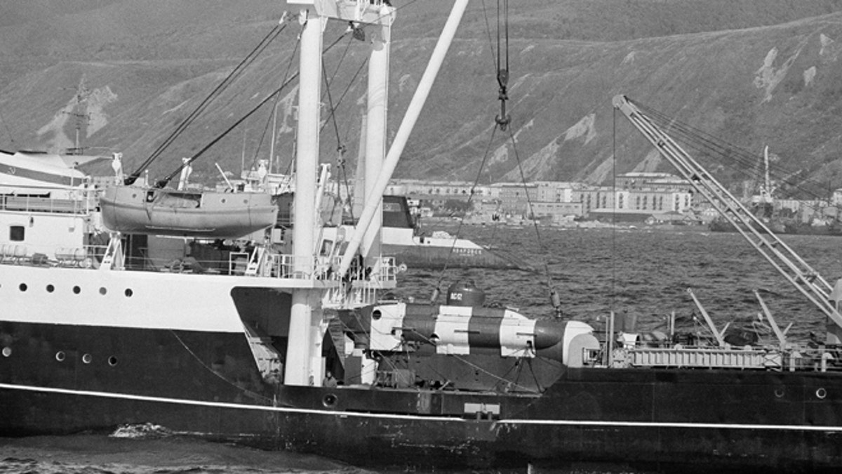 Sept. 27, 1983: A Soviet mini-submarine used to search for debris from Korean Air Lines Flight 007, shot down Sept. 1, 1983 near Sakhalin Island, rests on the deck of a conventional tender vessel in Nevel'sk, Sakhalin Island, in the East Sea off Russia.