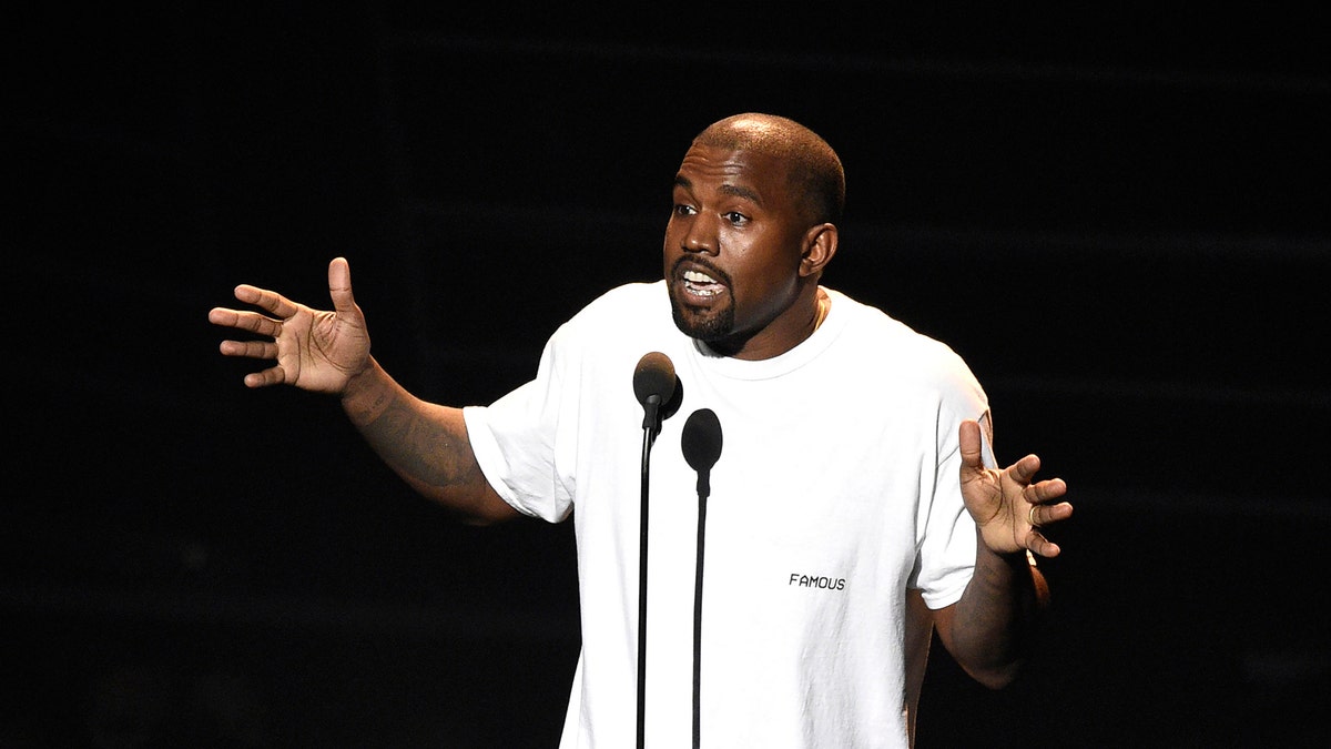 FILE - In this Aug. 28, 2016, file photo. Kanye West appears at the MTV Video Music Awards at Madison Square Garden in New York. West has called American slavery âa choice.â In an interview Tuesday on âTMZ Live,â West said, âWhen you hear about slavery for 400 years, for 400 years, that sounds like a choice.â West also told TMZ that he became addicted to opioids that doctors prescribed after he had surgery for liposuction in 2016. He was hospitalized for a week and had to cut short a tour. (Photo by Chris Pizzello/Invision/AP, File)