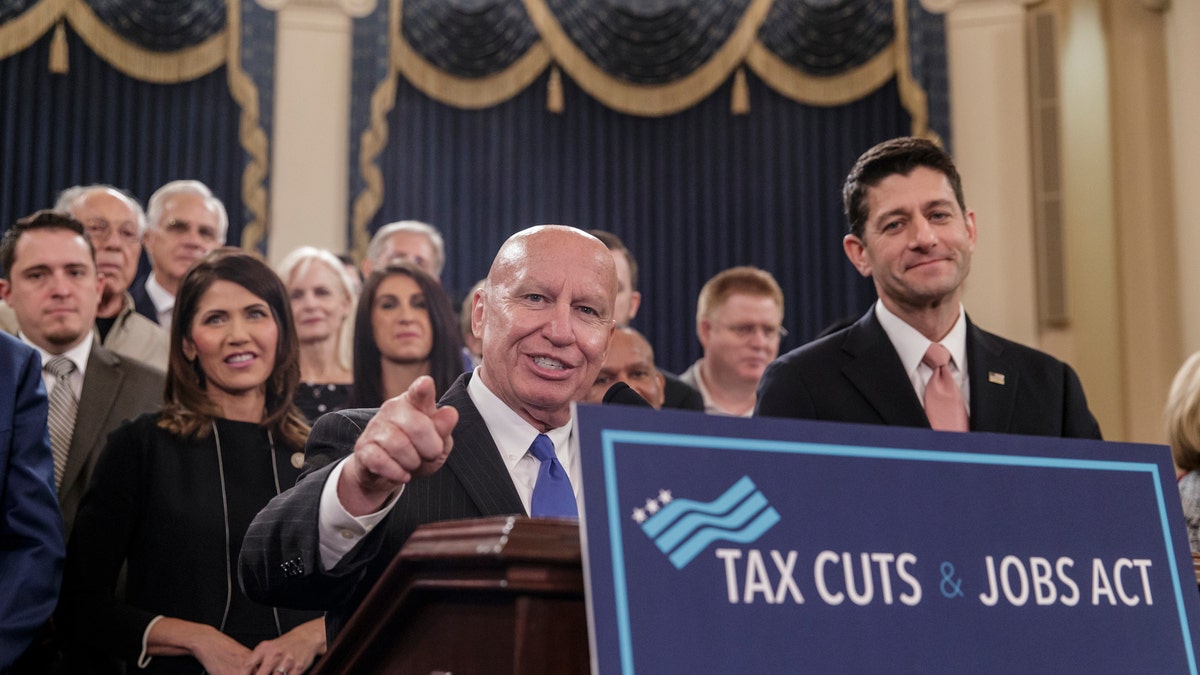 House Ways and Means Committee Chairman Kevin Brady, R-Texas, joined by Speaker of the House Paul Ryan, R-Wis., right, discusses the GOP's far-reaching tax overhaul. (AP Photo/J. Scott Applewhite)