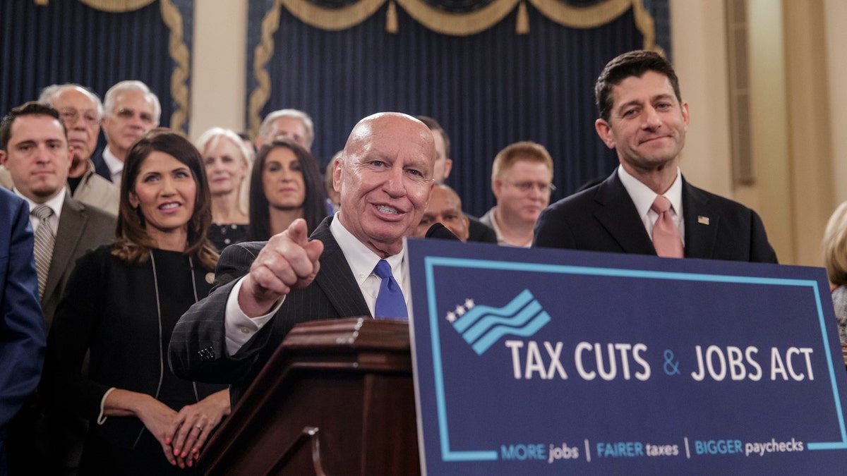 House Ways and Means Committee Chairman Kevin Brady, R-Texas, joined by Speaker of the House Paul Ryan, R-Wis., right, discusses the GOP's far-reaching tax overhaul. (AP Photo/J. Scott Applewhite)