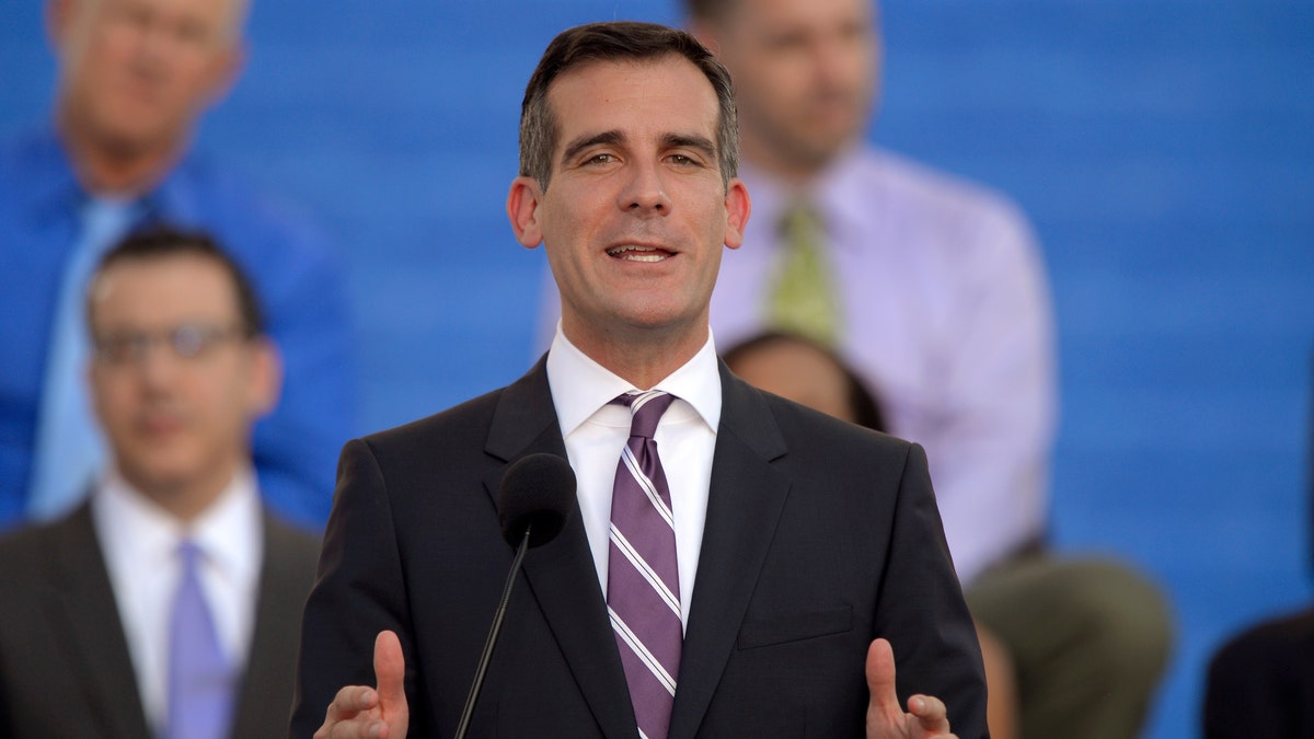 Los Angeles Mayor Eric Garcetti speaks in front of city hall after being sworn in, Sunday, June 30, 2013, in Los Angeles. (AP Photo/Mark J. Terrill)