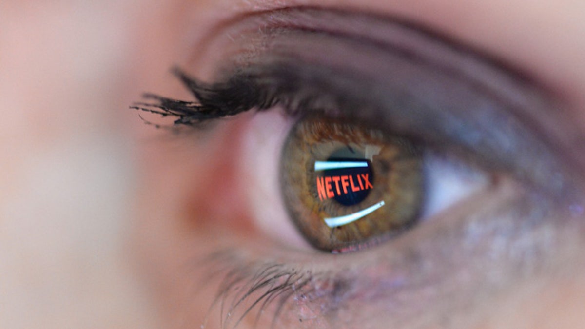 PARIS, FRANCE - SEPTEMBER 19:   In this photo illustration the Netflix logo is reflected in the eye of a woman on September 19, 2014 in Paris, France.  Netflix September 15 launched service in France, the first of six European countries planned in the coming months. (Photo by Pascal Le Segretain/Getty Images)