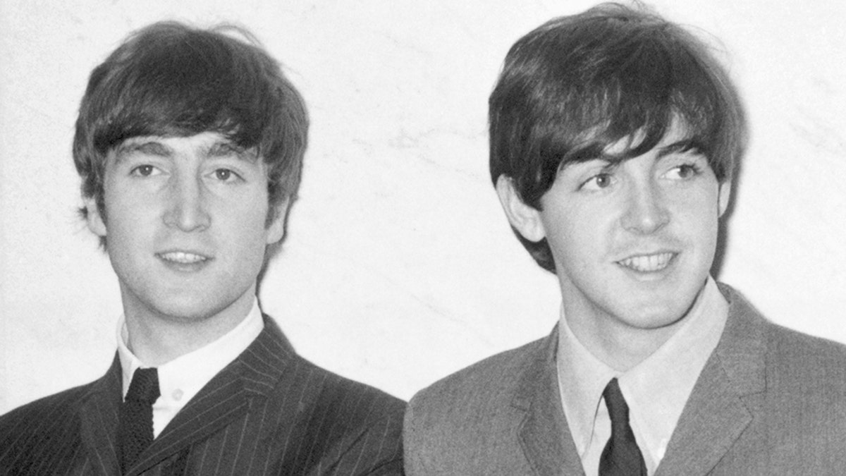 John Lennon and Paul McCartney seen here in December 1963 R9526 (Photo by Daily Mirror/Mirrorpix/Mirrorpix via Getty Images)