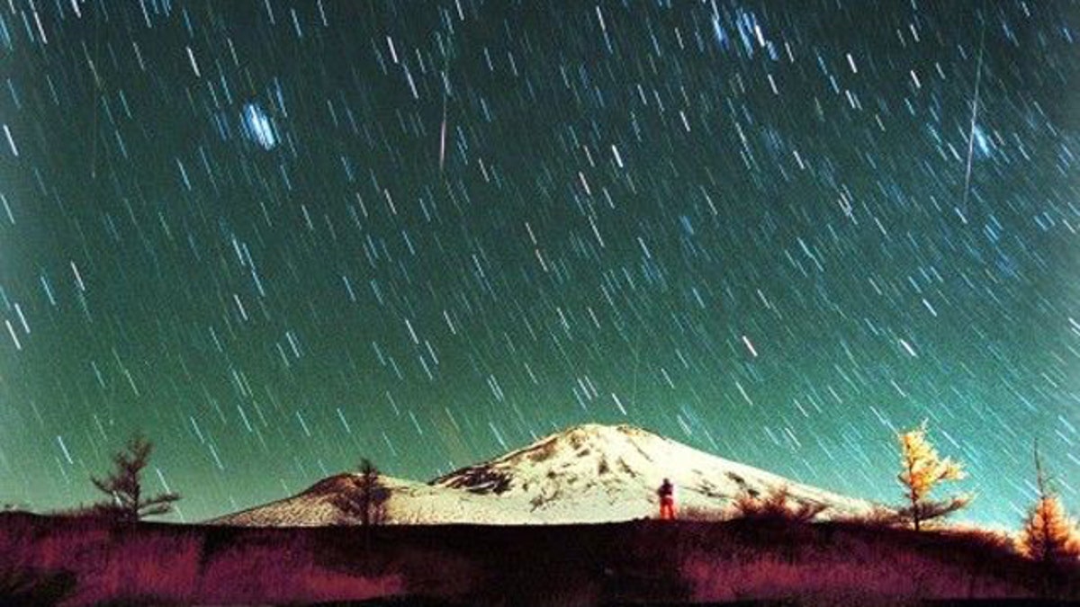 Leonid meteors are seen streaking across the sky over snow-capped Mount Fuji, Japan's highest mountain, early Monday Nov. 19, 2001, in this 7-minute exposure photo. Star gazers braved cold temperatures at the foot of Mount Fuji to observe the shower of Leonid meteors.