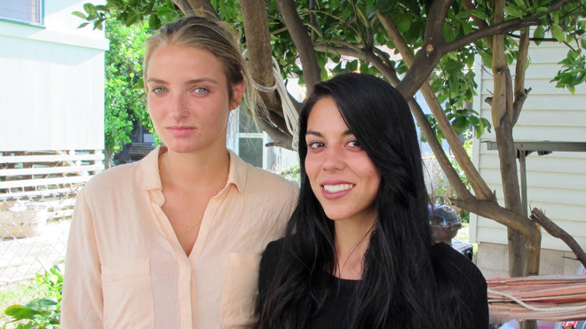 ccd7f2de-Gay Couple Police Lawsuit