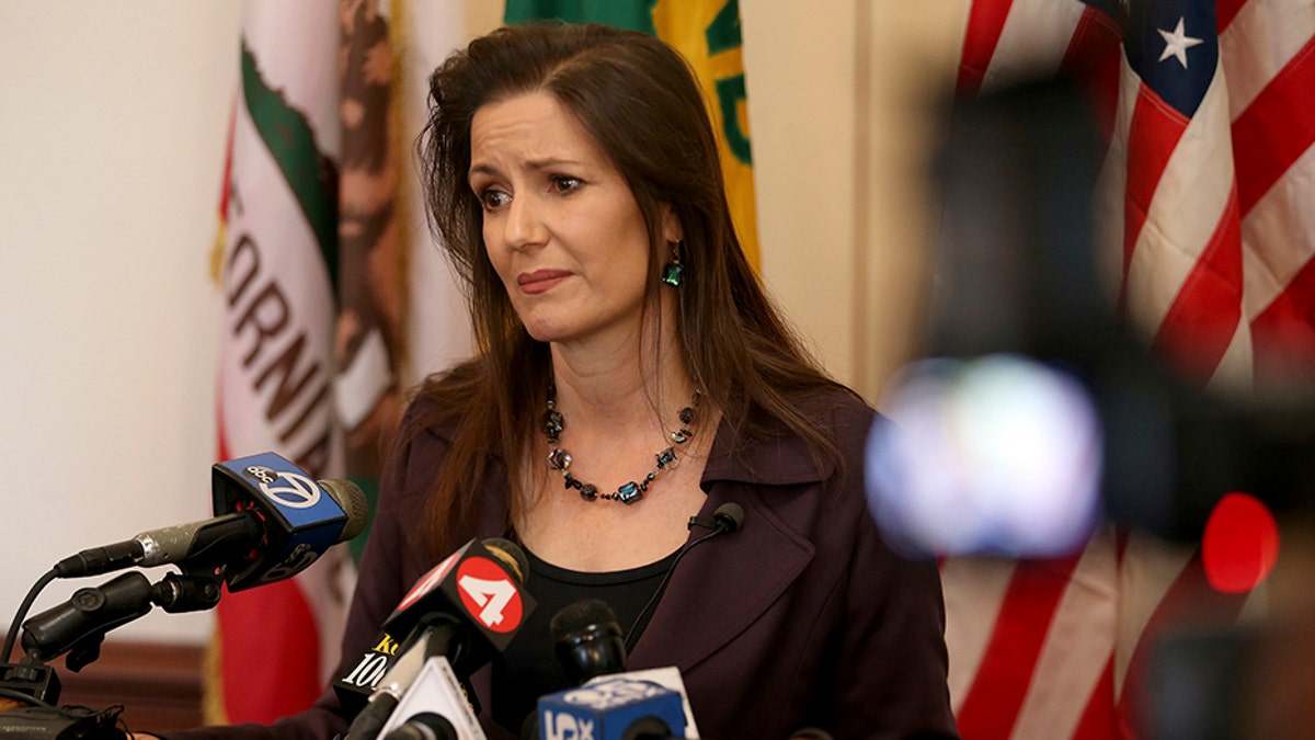 Oakland Mayor Libby Schaaf takes questions from the media during a press conference at City Hall in Oakland, Calif., Wednesday, Feb. 27, 2018. A top immigration official said Wednesday that about 800 people living illegally in Northern California were able to avoid arrest because of a weekend warning that Oakland Mayor Libby Schaaf put on Twitter. (Jane Tyska/San Jose Mercury News via AP)