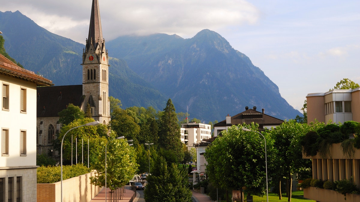 Vaduz church, downtown and Alps, Liechtenstein