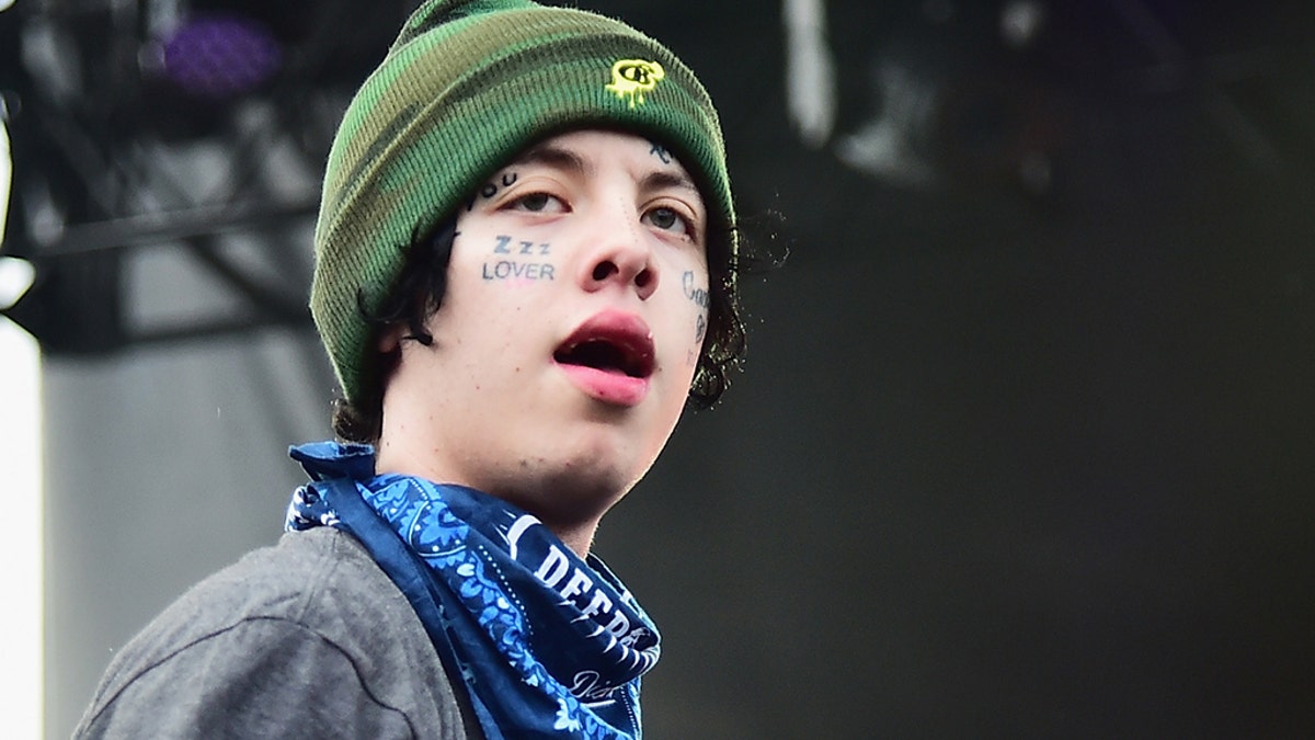 lil Xan pertorm onstage durign Day 1 of Billboard Hot 100 Festival