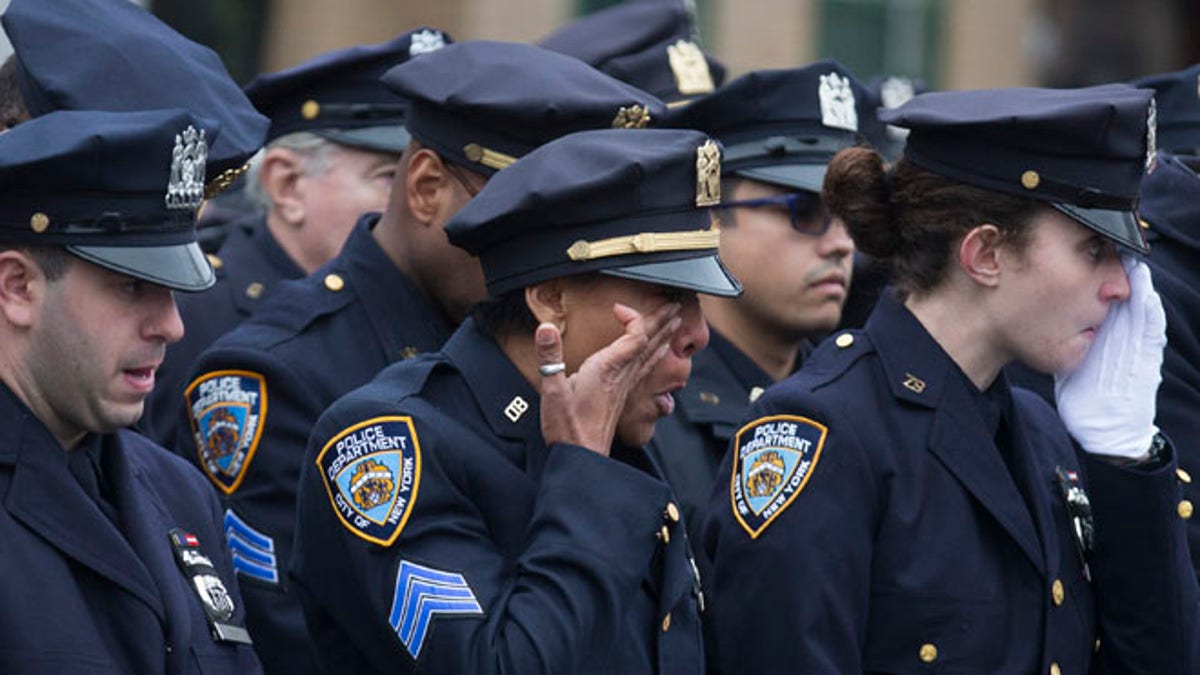 52fbebf7-NYPD Officers Shot