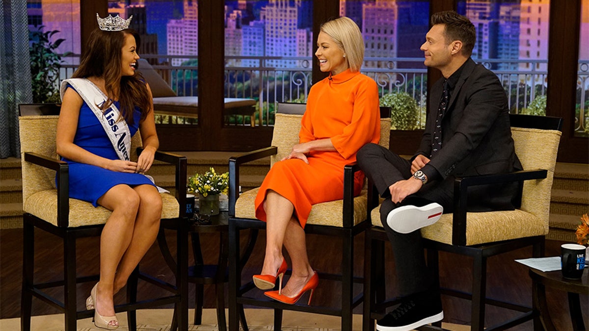Kelly Ripa and Ryan Seacrest talk with Miss America Cara Mund during the production of 