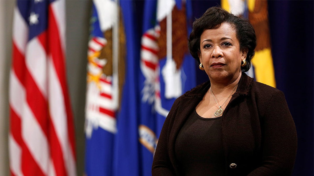 United States Attorney General Loretta Lynch waits to deliver her remarks at Veterans Appreciation Day at the Justice Department in Washington, U.S., November 2, 2016. REUTERS/Gary Cameron - D1BEUKNVUQAA