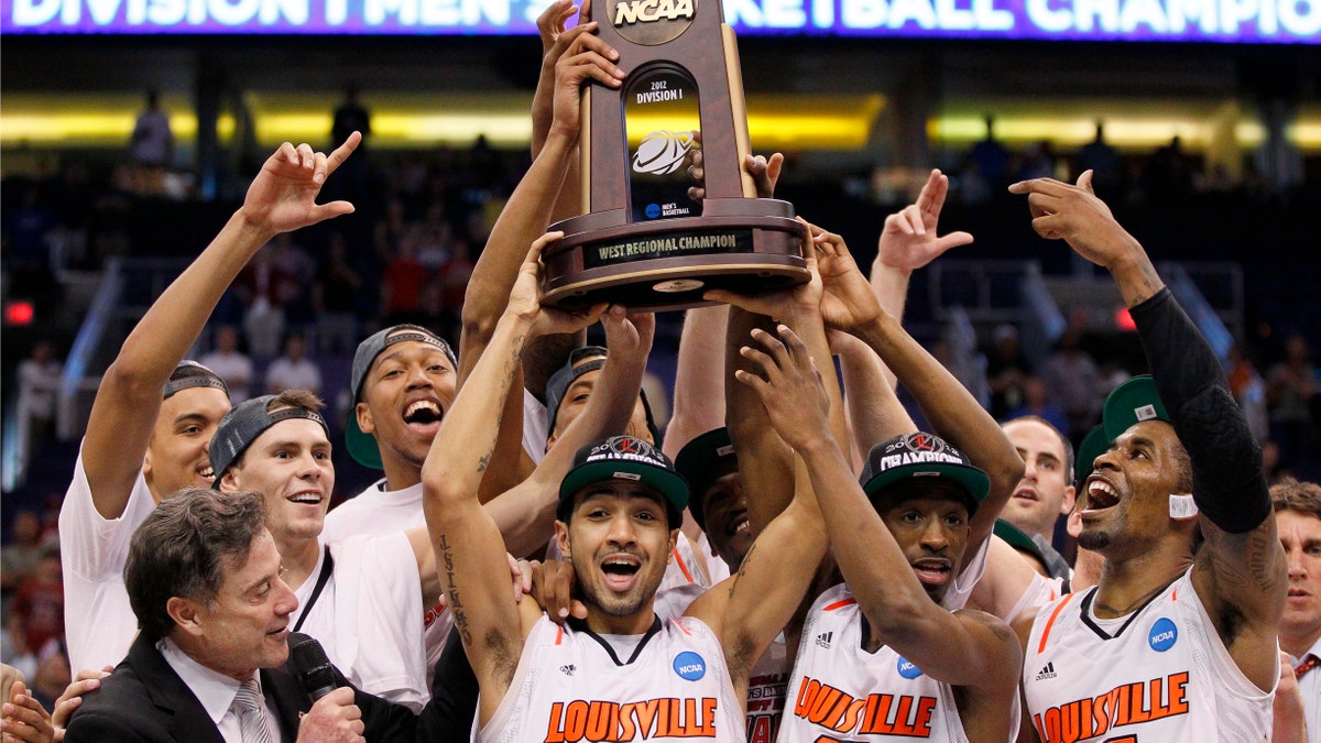 APTOPIX NCAA Florida Louisville Basketball