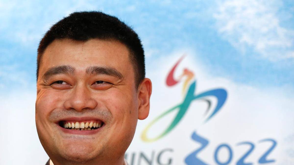 Yao Ming, retired Chinese professional basketball player smiles during a press conference for Beijing 2022 Olympic bid in Kuala Lumpur, Malaysia, Wednesday, July 29, 2015. Malaysia is hosting the 128th International Olympic Committee executive board meeting where the vote for the host cities of the 2022 Olympic Winter Games and for the 2020 Youth Olympic Winter Games will take place. (AP Photo/Vincent Thian)