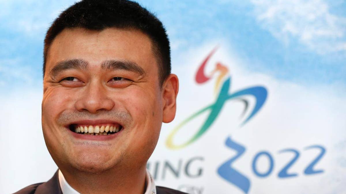 Yao Ming, retired Chinese professional basketball player smiles during a press conference for Beijing 2022 Olympic bid in Kuala Lumpur, Malaysia, Wednesday, July 29, 2015. Malaysia is hosting the 128th International Olympic Committee executive board meeting where the vote for the host cities of the 2022 Olympic Winter Games and for the 2020 Youth Olympic Winter Games will take place. (AP Photo/Vincent Thian)