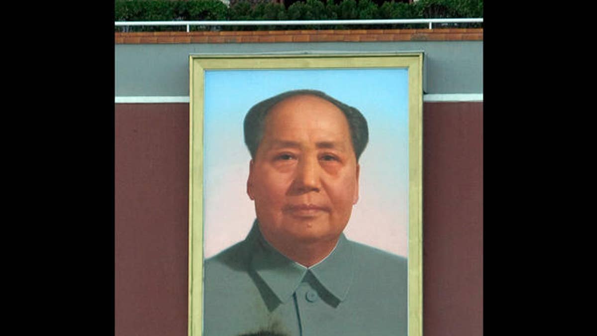 Photo of a giant portrait of former Chinese leader Mao Zedong at Tiananmen Square in Beijing