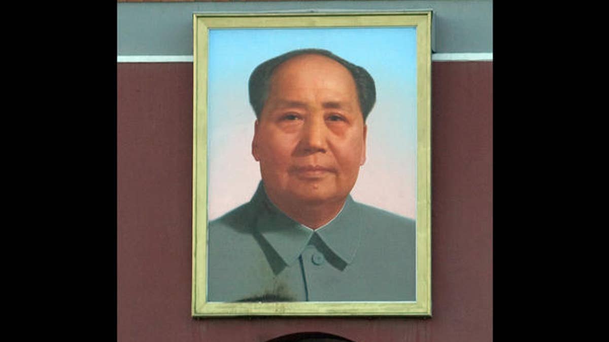 Photo of a giant portrait of former Chinese leader Mao Zedong at Tiananmen Square in Beijing