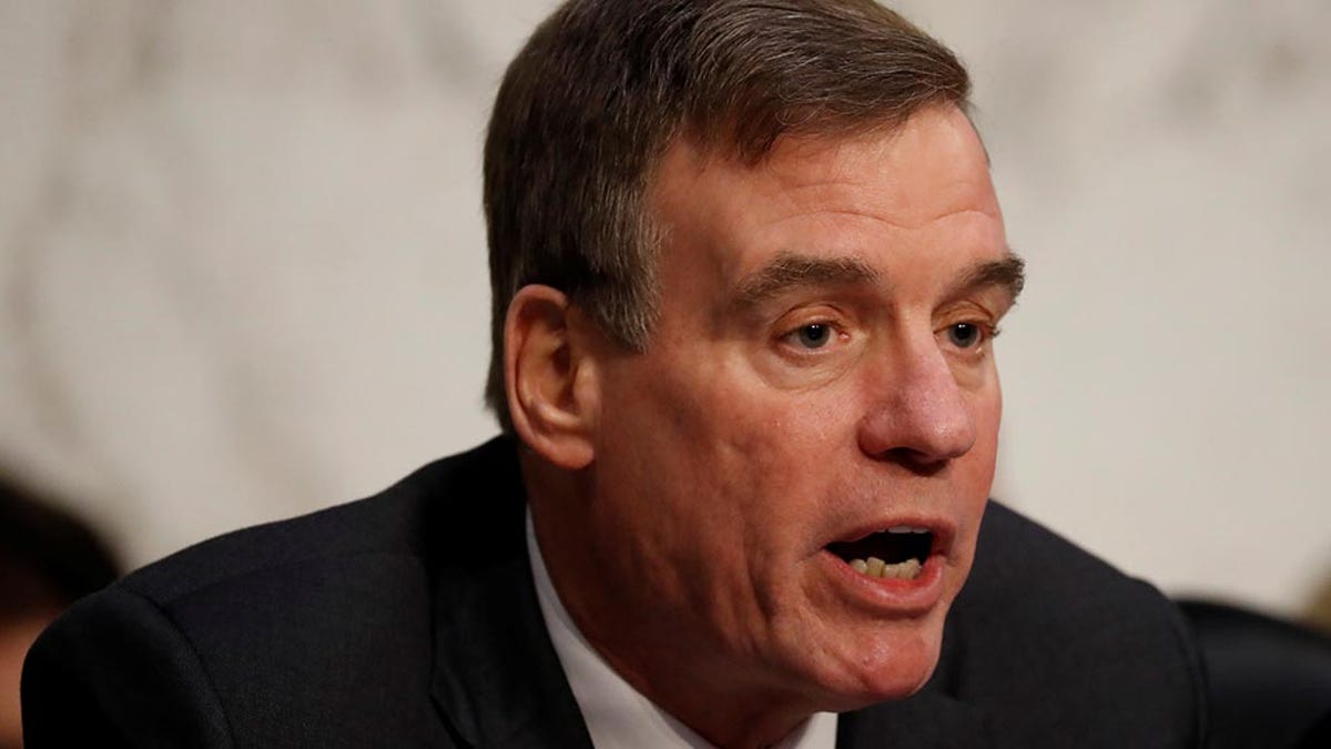 Senator Mark Warner (D-VA) speaks during a hearing of the Senate Intelligence Committee on Capitol Hill in Washington, U.S., February 13, 2018. REUTERS/Aaron P. Bernstein - RC1F0440D640