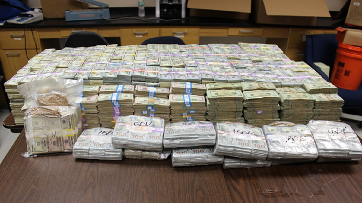 Miami police seize $24M in cash stuffed in Home Depot buckets, two ...