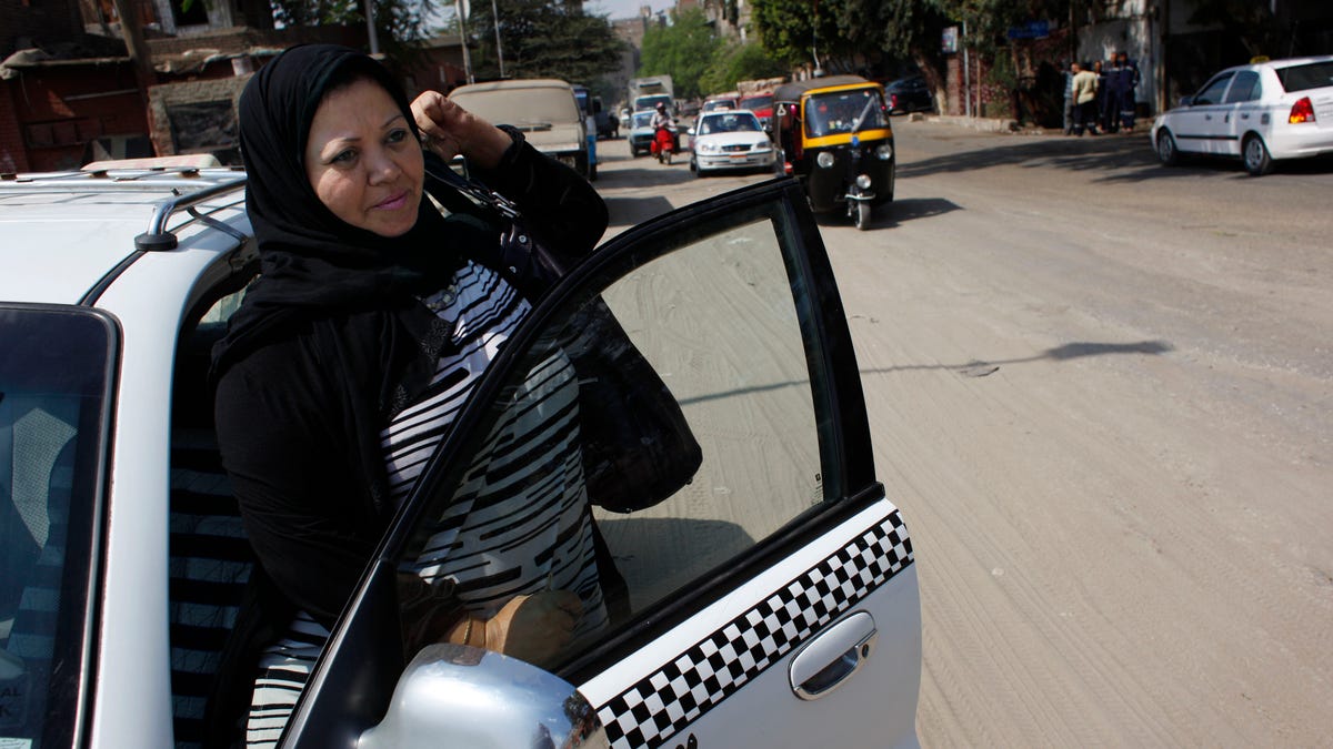 Mideast Egypt Woman Taxi Driver