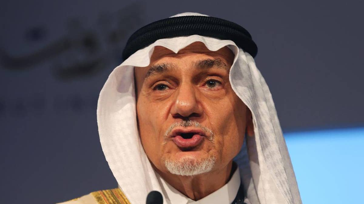 In this Saturday, Oct. 10, 2015 photo, Prince Turki al-Faisal talks to the audience during the opening day of the Beirut Institute Summit in Abu Dhabi, United Arab Emirates. The prince, who spoke to The Associated Press in an interview Sunday during a visit to Abu Dhabi, said the oversight and management of the annual Islamic hajj pilgrimage is 