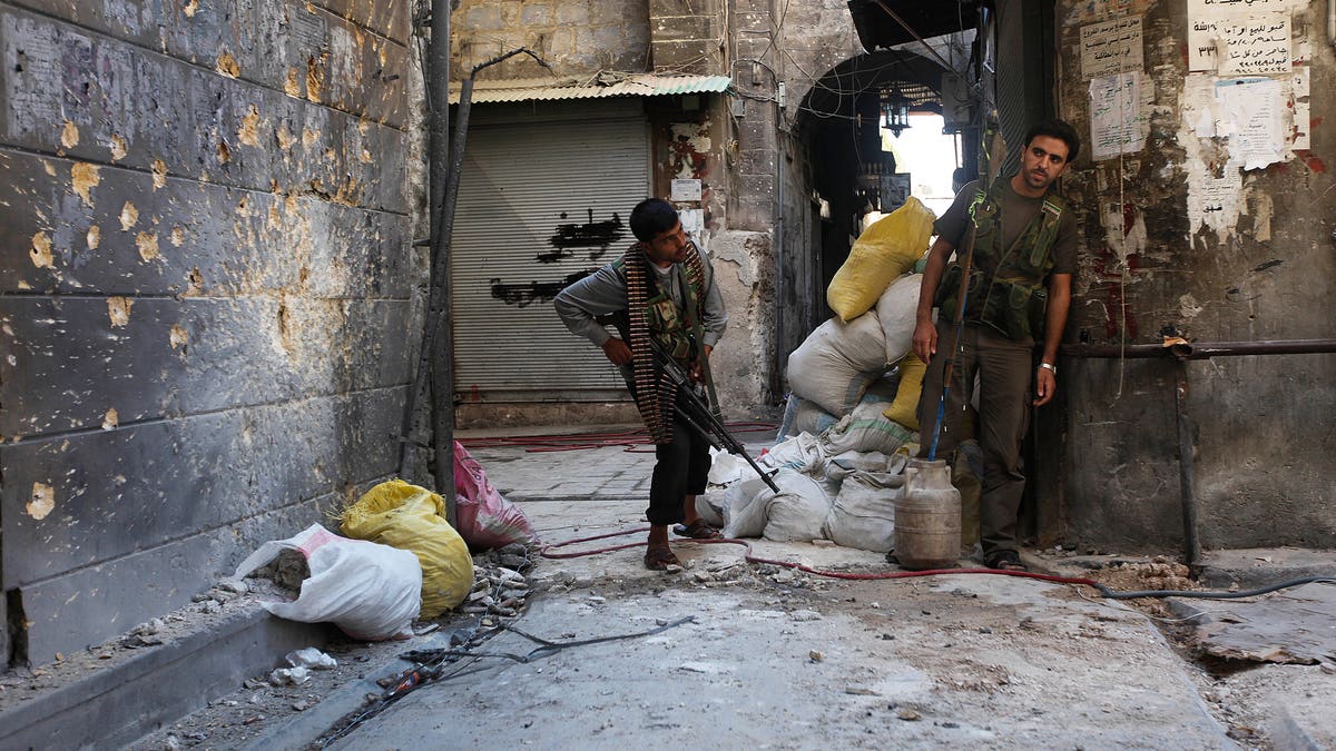 01575ffd-Mideast Syria Militants