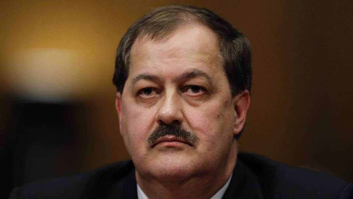 FILE - In this May 20, 2010 photo, Massey Energy Company Chief Executive Officer Don Blankenship pauses as he testifies on Capitol Hill in Washington. The former CEO who oversaw the West Virginia mine that exploded in 2010, killing 29 people, has been indicted on federal charges related to a mine safety investigation. U.S. Attorney Booth Goodwin said a federal grand jury indicted Blankenship on Thursday, Nov. 13, 2014. (AP Photo/Carolyn Kaster, File)