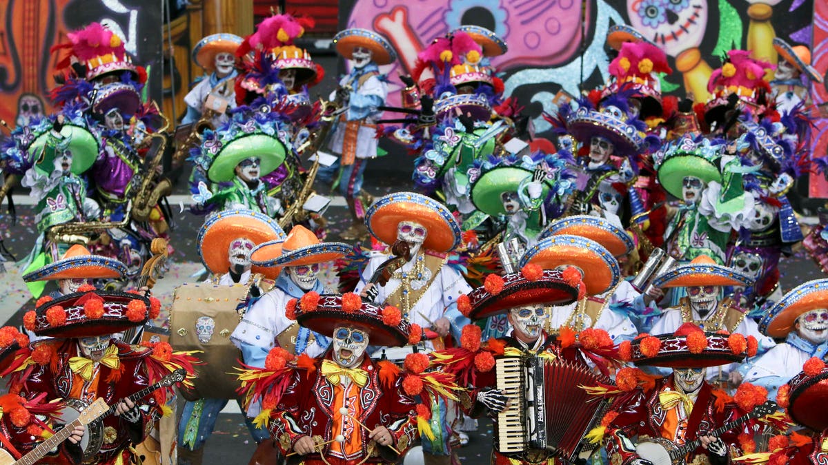 Members of the South Philadelphia String Band perform during the 116th annual Mummers Parade in Philadelphia on Friday, Jan. 1, 2016. Outrageously costumed Mummers strutted their stuff Friday at the city's annual New Year's Day parade, a colorful celebration that features string bands, comic brigades, elaborate floats and plenty of feathers and sequins. (AP Photo/Joseph Kaczmarek)