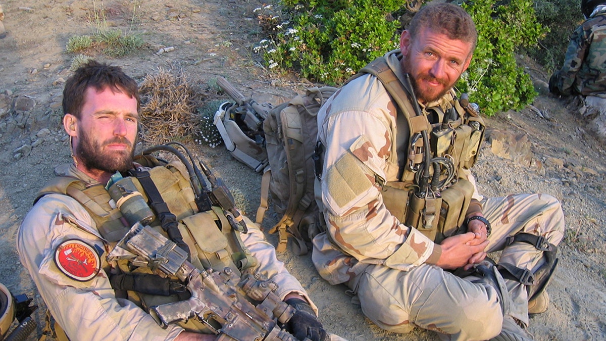 Navy file photo of SEAL Lt. Michael P. Murphy, from Patchogue, N.Y., and sonar technician (surface) Petty Officer 2nd Class Matthew G. Axelson, of Cupertino, Calif., taken in Afghanistan. Both were assigned to SEAL Delivery Vehicle Team 1, Pearl Harbor, Hawaii. Murphy and Axelson were killed by enemy forces during a reconnaissance mission, Operation Red Wing, June 28, 2005. They were part of a four-man team tasked with finding a key Taliban leader in the mountainous terrain near Asadabad, Afghanistan, when they came under fire from a much larger enemy force with superior tactical position.