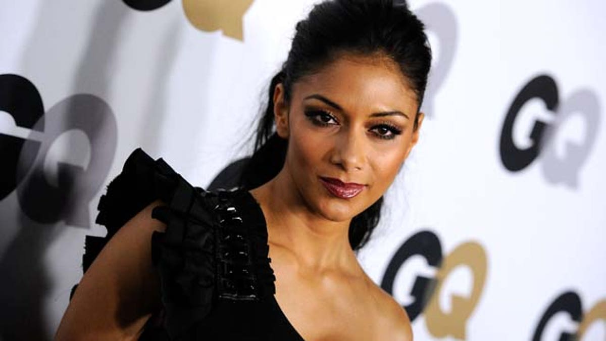 LOS ANGELES, CA - NOVEMBER 17: Singer Nicole Scherzinger arrives at the 16th Annual GQ