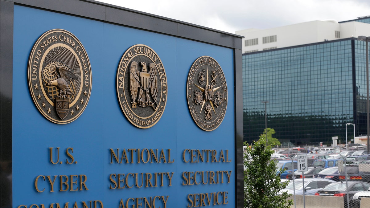 FILE - This June 6, 213 file photo shows the sign outside the National Security Agency (NSA) campus in Fort Meade, Md. The National Security Agency declassified three secret U.S. court opinions Wednesday, Aug. 21, 2013, showing how it scooped up as many as 56,000 emails and other communications by Americans with no connection to terrorism annually over three years, how it revealed the error to the court and changed how it gathered Internet communications.  (AP Photo/Patrick Semansky, File)