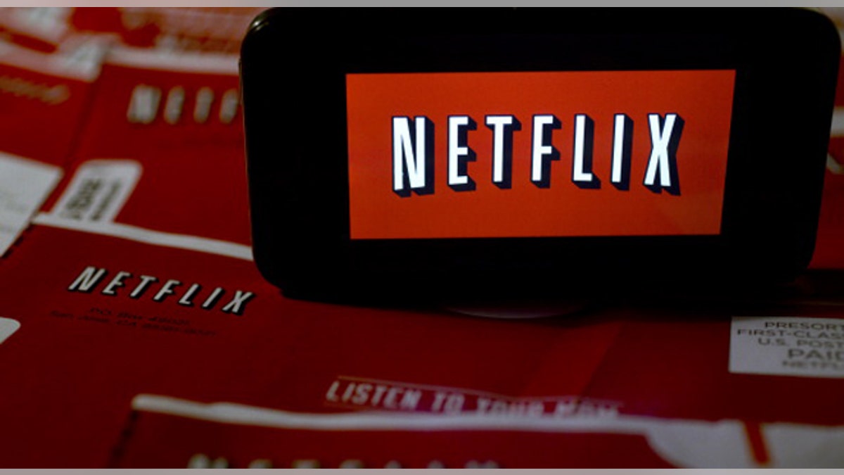The Netflix Inc. logo is displayed on an Apple Inc. iPhone arranged for a photograph in Washington, D.C., U.S., on Tuesday, Jan. 21, 2014. Netflix Inc., the largest subscription streaming service, is expected to release earnings data on Jan. 22. Photographer: Andrew Harrer/Bloomberg via Getty Images