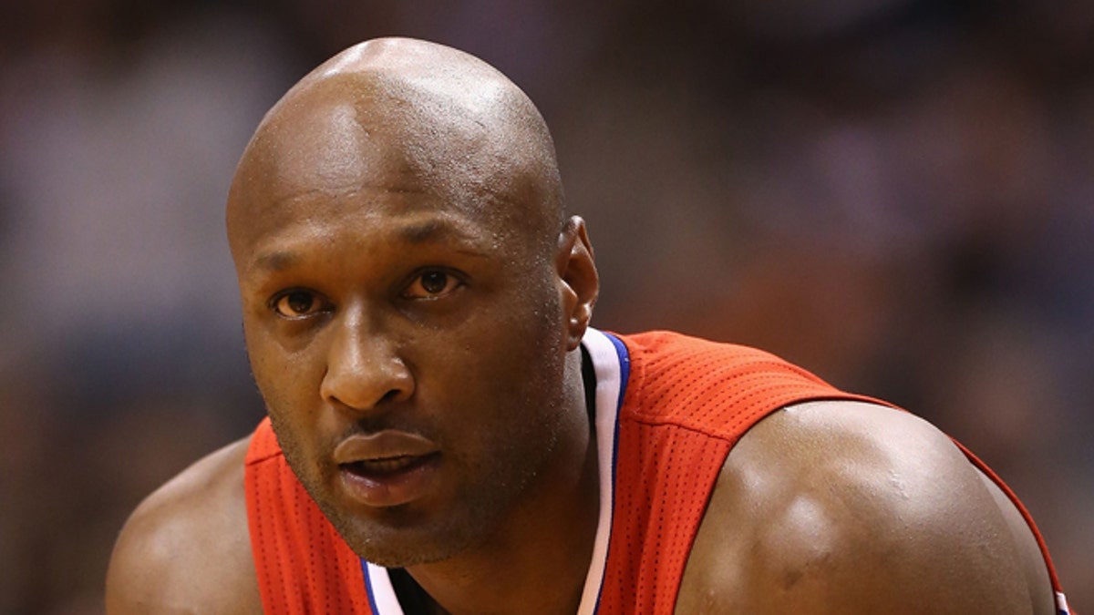 PHOENIX, AZ - JANUARY 24:  Lamar Odom #7 of the Los Angeles Clippers during the NBA game against the Phoenix Suns at US Airways Center on January 24, 2013 in Phoenix, Arizona. The Suns defeated the Clippers 93-88.  NOTE TO USER: User expressly acknowledges and agrees that, by downloading and or using this photograph, User is consenting to the terms and conditions of the Getty Images License Agreement.  (Photo by Christian Petersen/Getty Images) *** Local Caption *** Lamar Odom