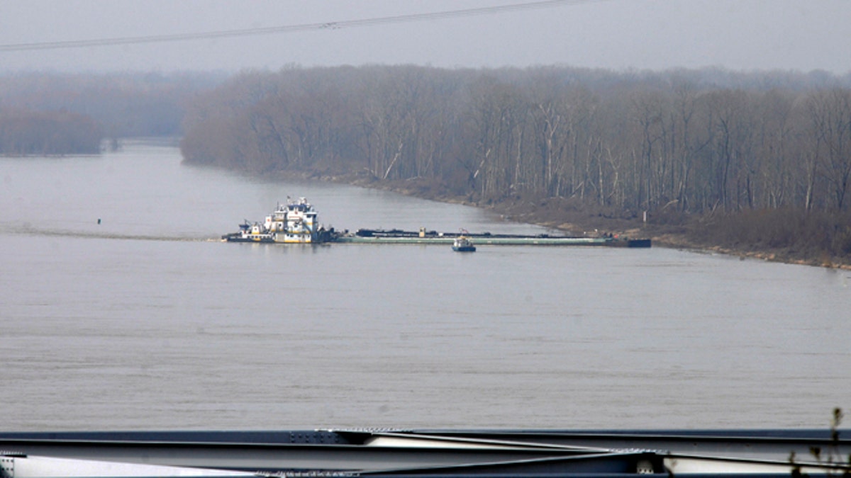 80c002ce-Oil Barges Hit Bridge