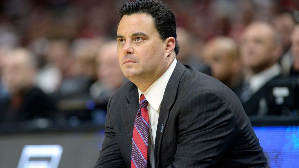 <p>Mar 28, 2015; Los Angeles, CA, USA; Arizona Wildcats head coach Sean Miller watches game action against Wisconsin Badgers during the first half in the finals of the west regional of the 2015 NCAA Tournament at Staples Center. Mandatory Credit: Richard Mackson-USA TODAY Sports ,Mar 28, 2015; Los Angeles, CA, USA; Arizona Wildcats head coach Sean Miller watches game action against Wisconsin Badgers during the first half in the finals of the west regional of the 2015 NCAA Tournament at Staples Center. Mandatory Credit: Richard Mackson-USA TODAY Sports</p>