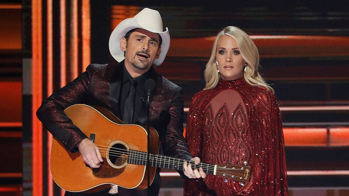 NASHVILLE, TN - NOVEMBER 08:  Brad Paisley and Carrie Underwood perform during the 51st annual CMA Awards at the Bridgestone Arena on November 8, 2017 in Nashville, Tennessee.  (Photo by Taylor Hill/FilmMagic)