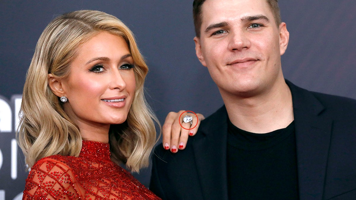 2018 iHeartRadio Music Awards - Arrivals â Los Angeles, California, U.S., 11/03/2018 â Paris Hilton and Chris Zylka. REUTERS/Mario Anzuoni - HP1EE3B1U6JOY