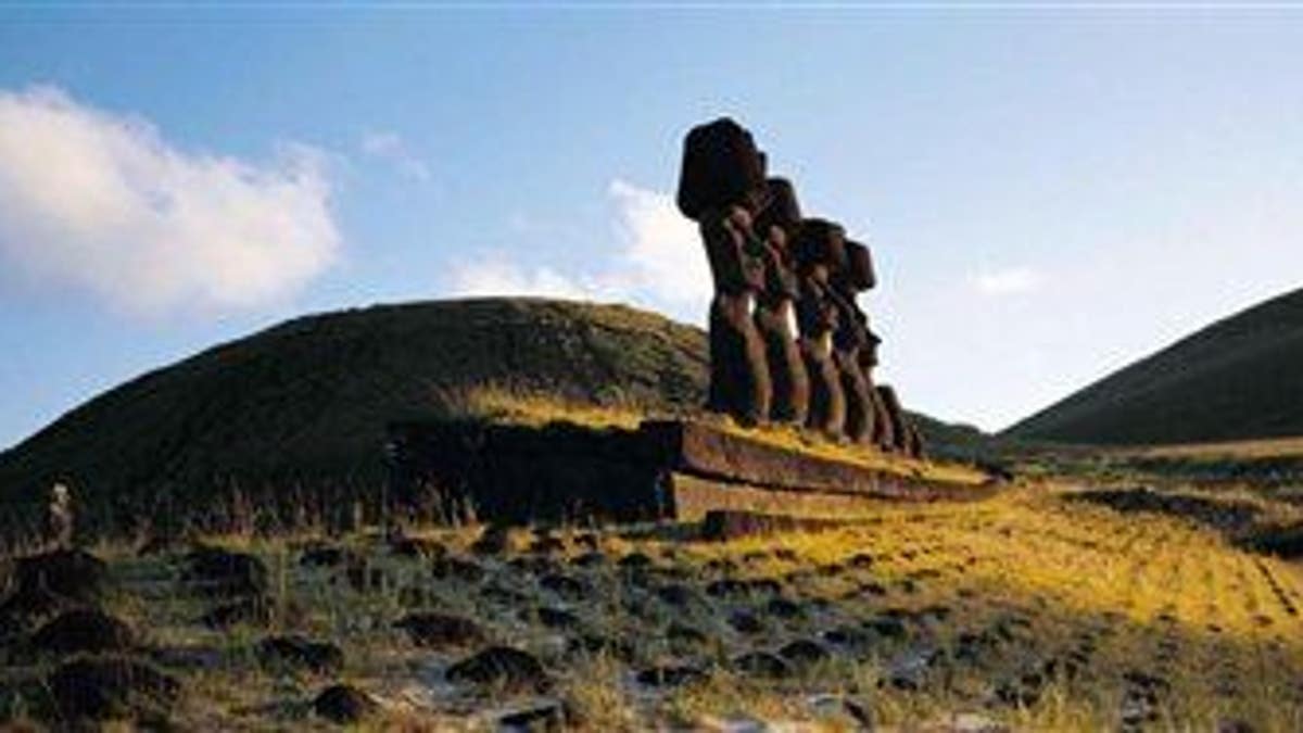 This undated photo released by Explora en Rapa Nui shows some of the massive Moai statues on Easter Island.