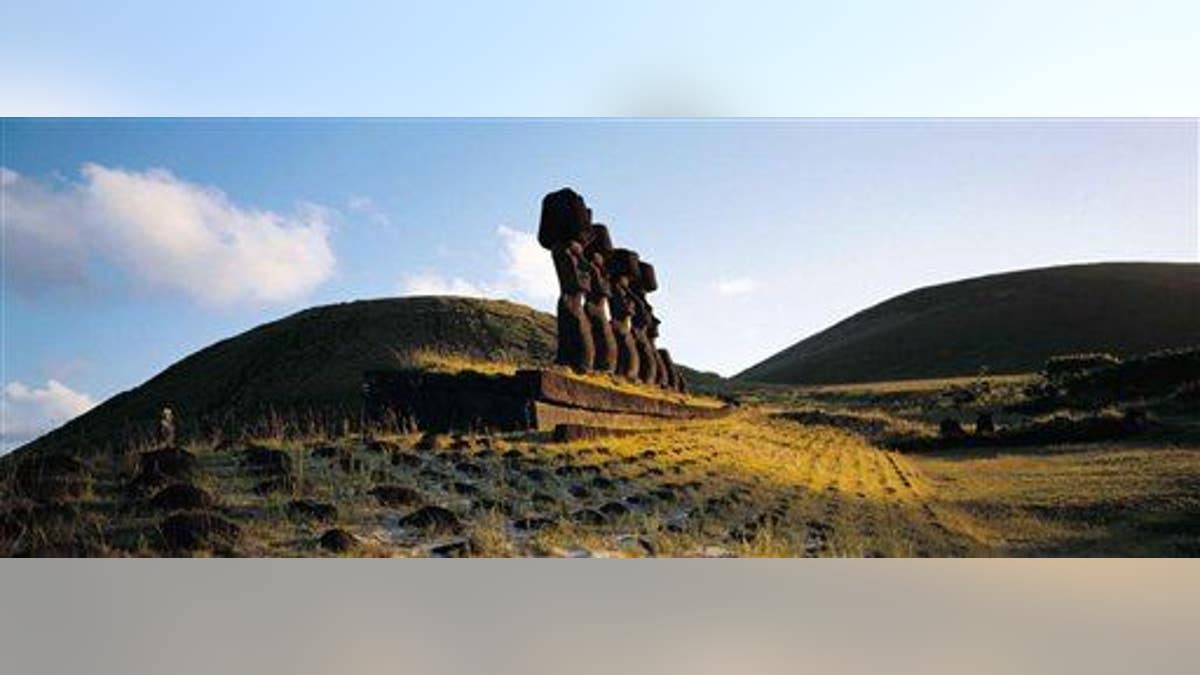 This undated photo released by Explora en Rapa Nui shows some of the massive Moai statues on Easter Island.