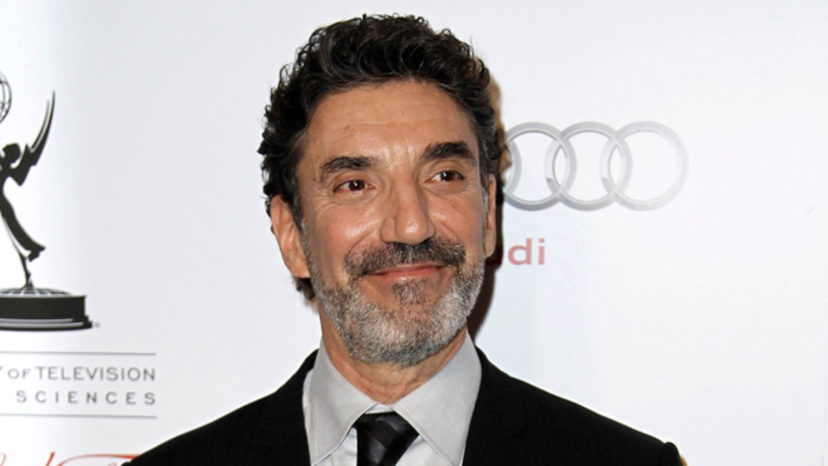 FILE - This March 1, 2012 file photo shows honoree Chuck Lorre at the Academy of Television Arts and Sciences 21st Annual Hall of Fame Gala in Beverly Hills, Calif. Lorre who writes, produces and is a co-creator of such sitcoms as Two and a Half Men, The Big Bang Theory and Mike and Molly is publishing a coffee table book of the cards called, What Doesn't Kill Us, Makes Us Bitter. The book will be published by Simon & Schuster, a division of CBS Corporation, in October. (AP Photo/Matt Sayles, file)