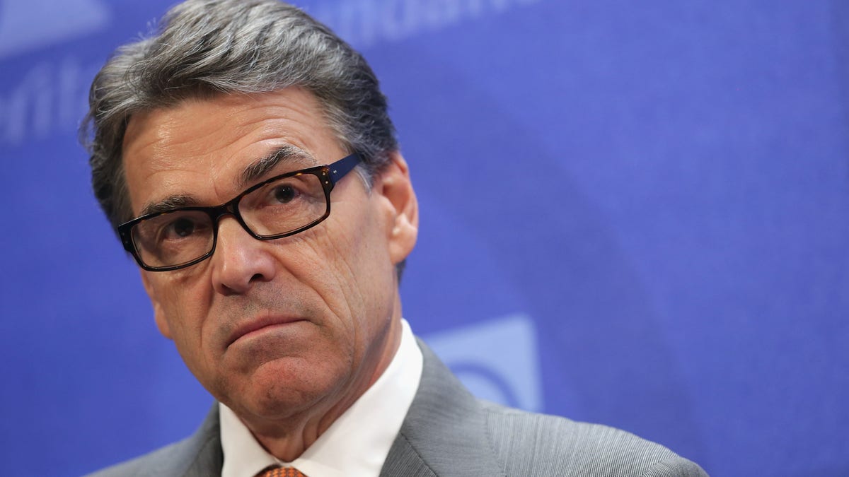 WASHINGTON, DC - AUGUST 21:  Texas Governor Rick Perry delivers remarks about immigration and the need for more aggressive enforcement along the Texas-Mexico border at the conservative think tank The Heritage Foundation August 21, 2014 in Washington, DC. The governor of Texas since 2000 and a one-time presidential candidate, Perry was recently indicted by a Travis County grand jury for abuse of power and coercion of a public servant after he vetoed $7.5 million in funding for the state's Public Integrity Unit, which is investigating Perry's Cancer Prevention and Research Institute of Texas.  (Photo by Chip Somodevilla/Getty Images)
