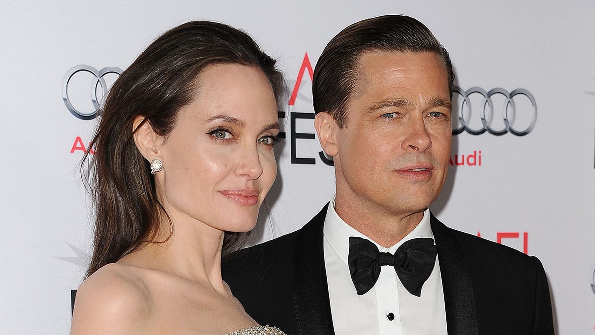 HOLLYWOOD, CA - NOVEMBER 05:  Angelina Jolie and Brad Pitt attend the premiere of 