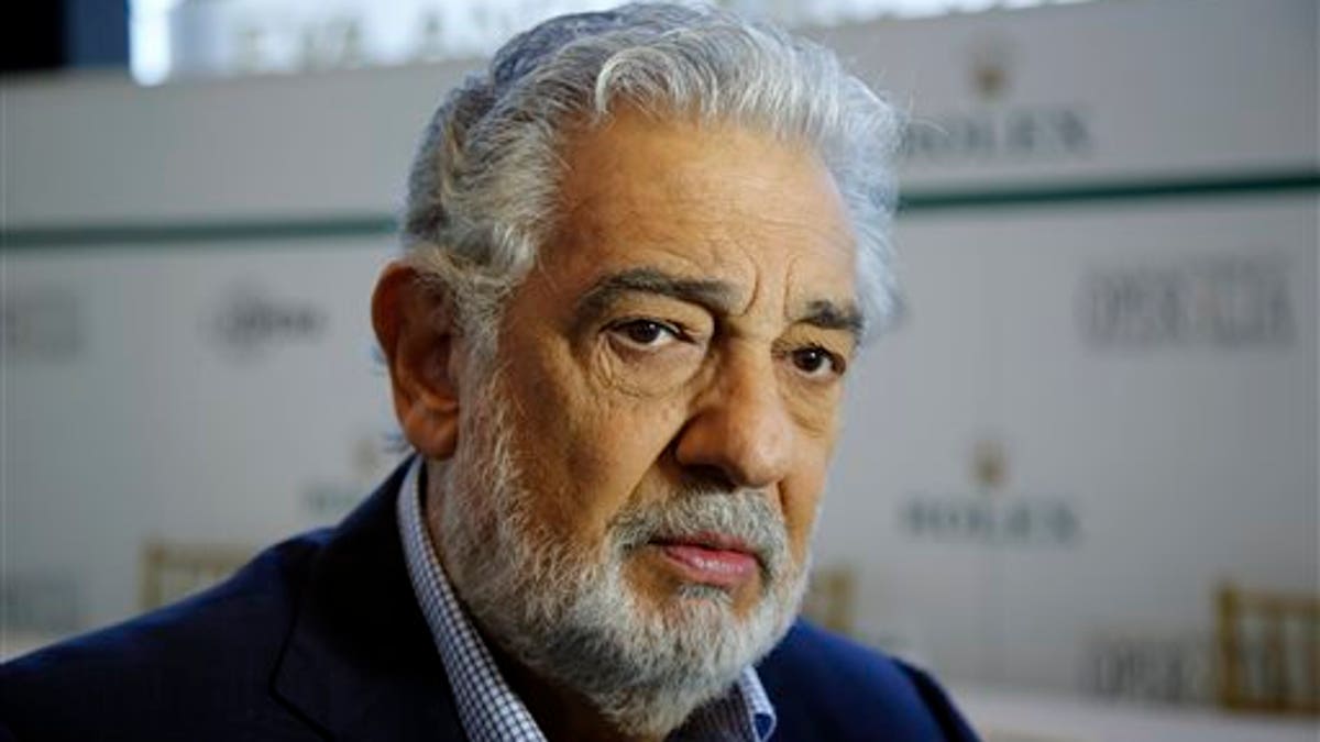Spanish tenor Placido Domingo gives details about the opera competition Operalia at the Dorothy Chandler Pavilion in Los Angeles, Tuesday, Aug. 26, 2014. Domingos Operalia, the World Opera Competition, returns to Los Angeles and will be held from Aug. 25 through Aug. 30. (AP Photo/Damian Dovarganes)