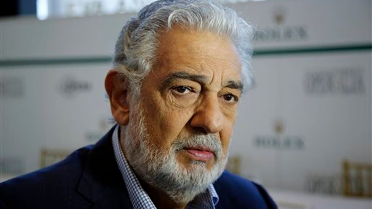 Spanish tenor Placido Domingo gives details about the opera competition Operalia at the Dorothy Chandler Pavilion in Los Angeles, Tuesday, Aug. 26, 2014. Domingos Operalia, the World Opera Competition, returns to Los Angeles and will be held from Aug. 25 through Aug. 30. (AP Photo/Damian Dovarganes)