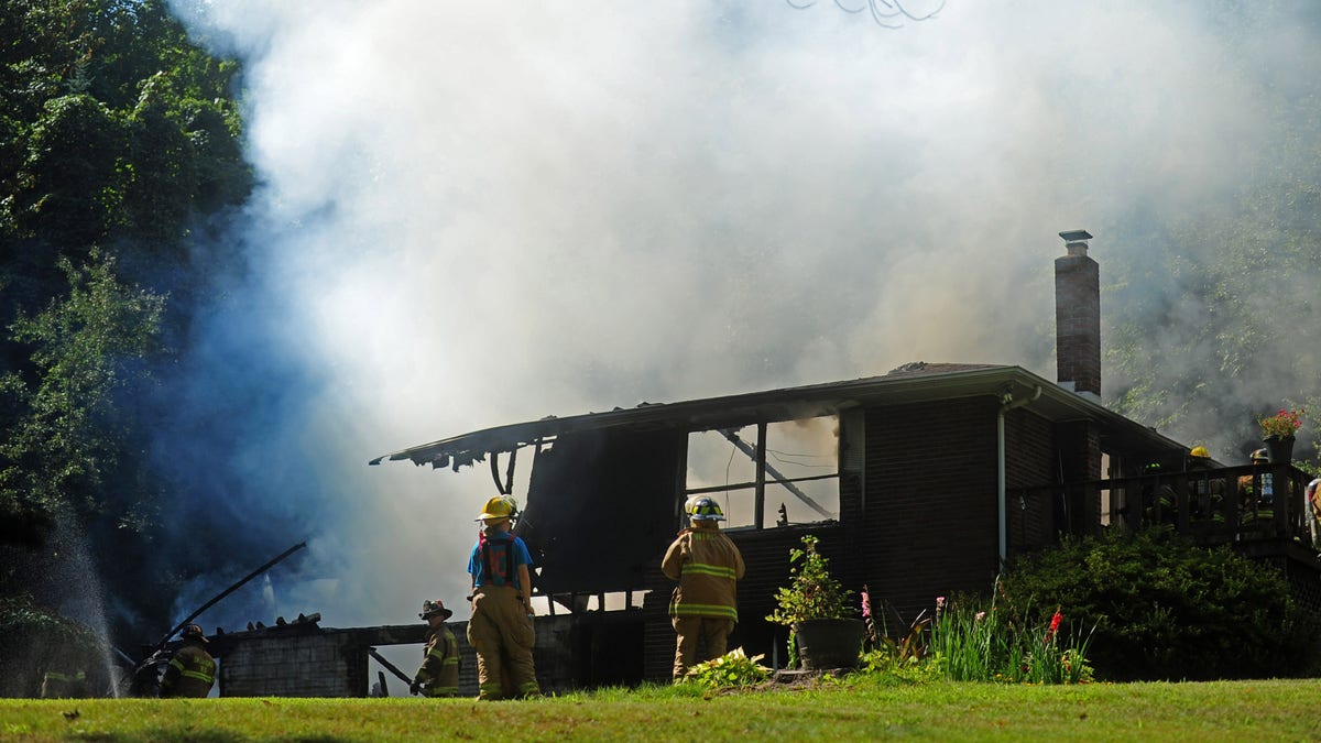 Plane Into House