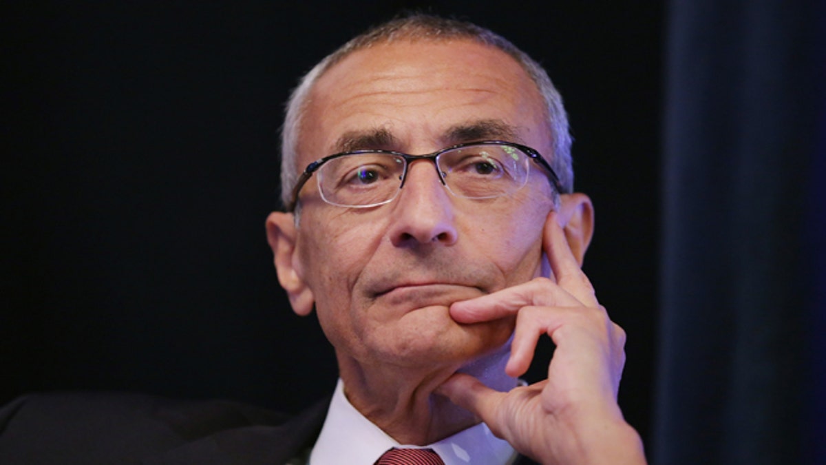 WASHINGTON, DC - OCTOBER 24:  Center for American Progress Co-founder John Podesta moderates a panel discussion during a conference commemorating the 10th anniversary of the center at the Astor Ballroom of the St. Regis Hotel October 24, 2013 in Washington, DC. Former Clinton Administration Chief of Staff Podesta co-founded the liberal public policy research and advocacy organization as a think tank that rivals conservative policy groups, such as the Heritage Foundation and the American Enterprise Institute.  (Photo by Chip Somodevilla/Getty Images)