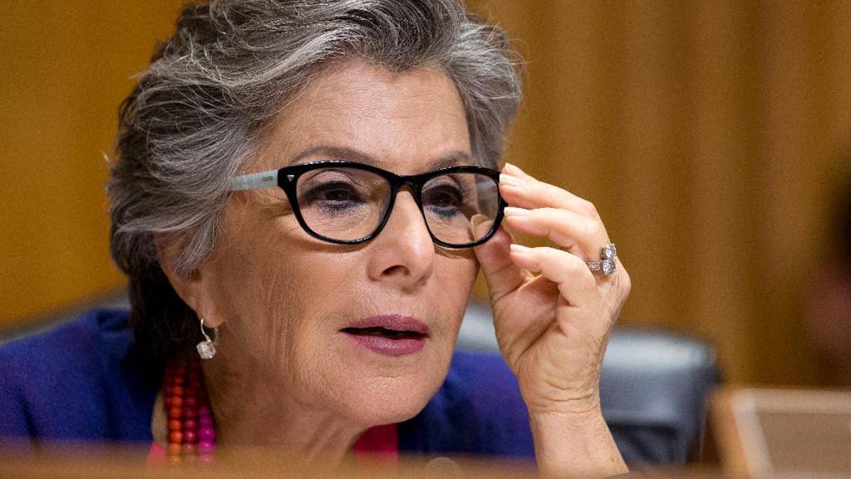 In the photo taken July 15, 2015, Sen. Barbara Boxer, D-Calif. speaks on Capitol Hill in Washington. The president's Cabinet, the diplomatic corps and members of the Supreme Court, six of whom are Catholic, are expected to join senators and House members in the seats on the floor of the chamber. The House recently took the unusual step of voting to limit the people who can sit in those prime seats, essentially barring former members. (AP Photo/Manuel Balce Ceneta)