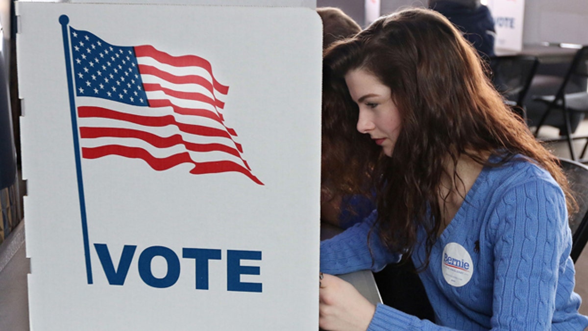 Woman at voting booth