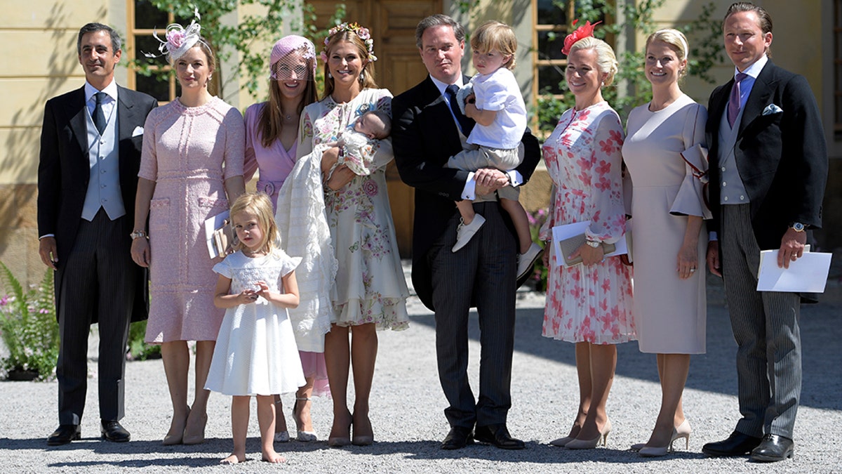 Young Princess Leonore gets attention at her sister's christening for ...