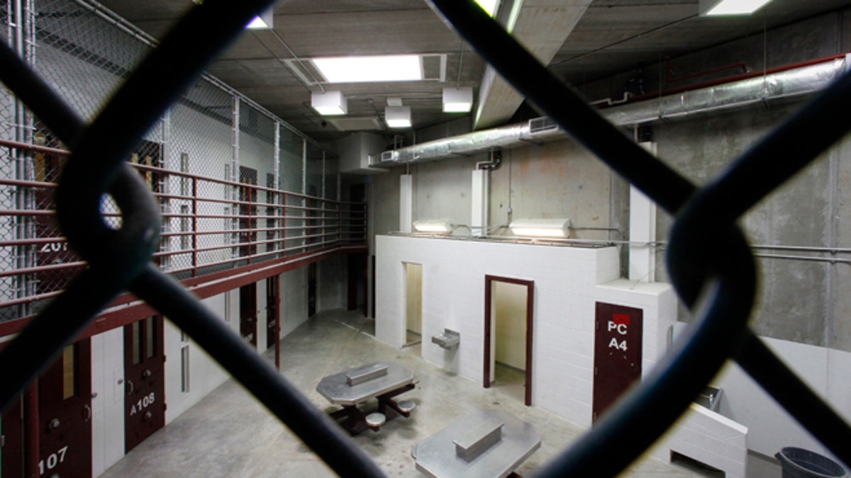The interior of an unoccupied communal cellblock is seen at Camp VI, a prison used to house detainees at the U.S. Naval Base at Guantanamo Bay.