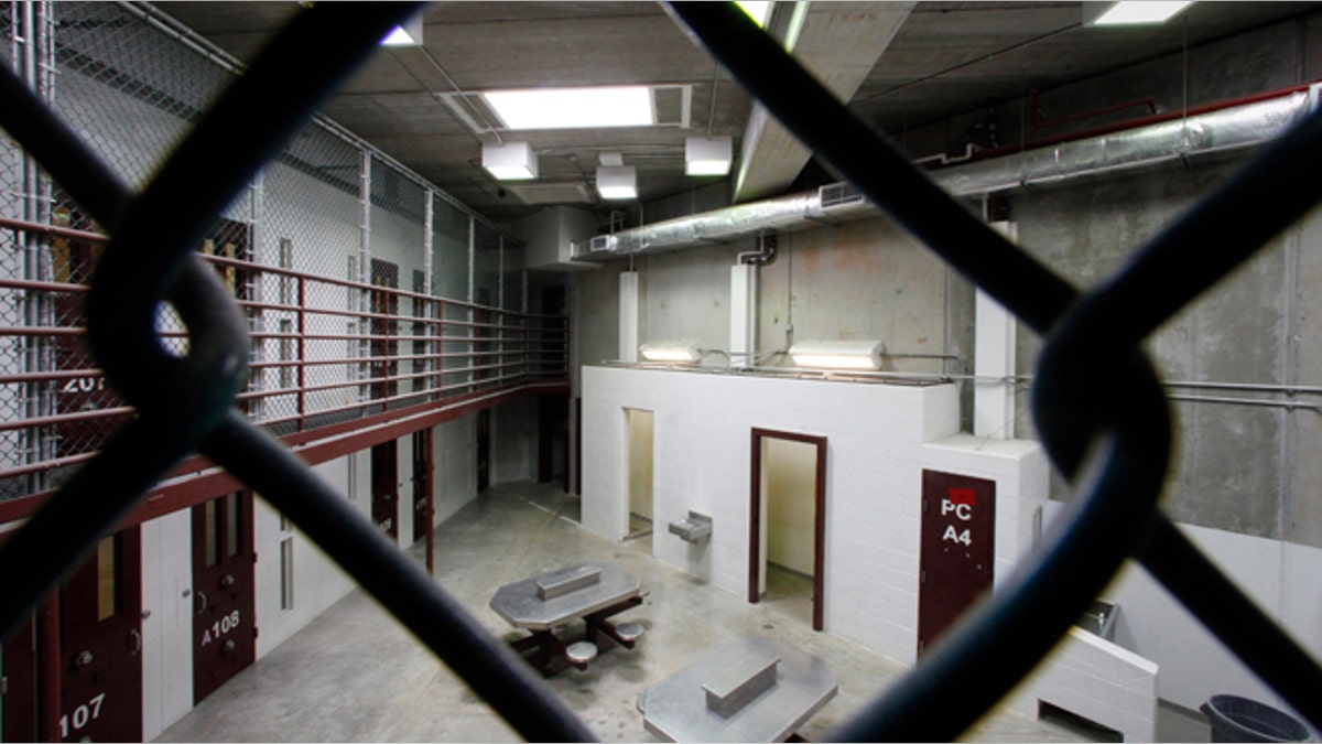 The interior of an unoccupied communal cellblock is seen at Camp VI, a prison used to house detainees at the U.S. Naval Base at Guantanamo Bay.